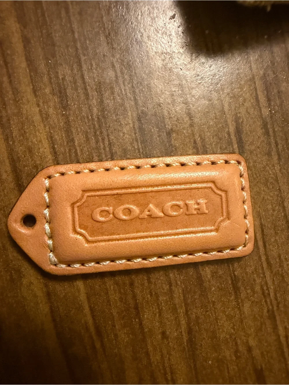 COACH Tan Vachetta Leather Key Tag - Signature Embossed
